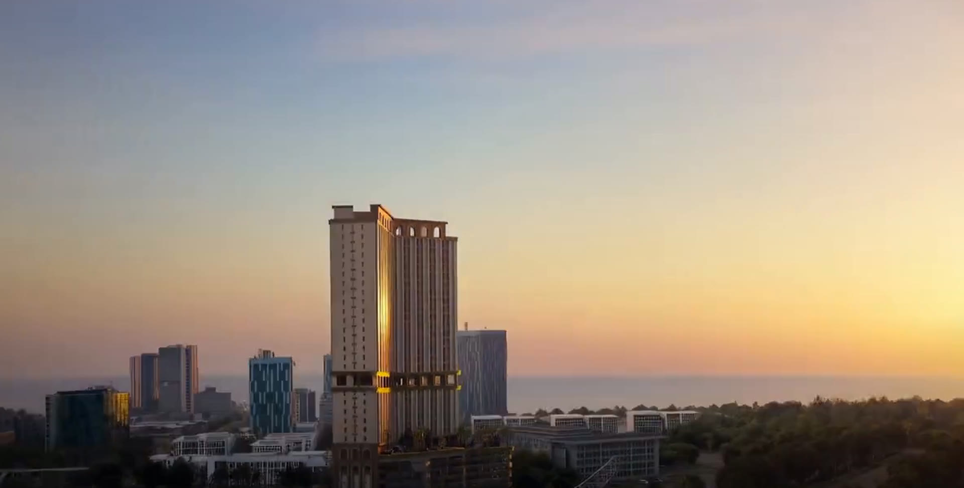 Cataluña tower at dusk — the real-time render buyers walk through
